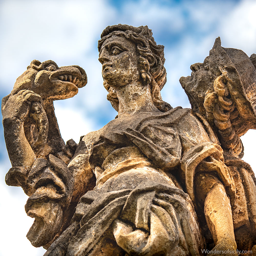 Statues on the wall at Villa Palagonia