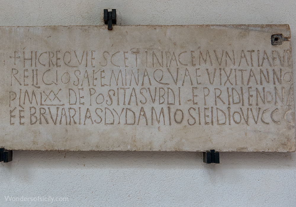 fragment of a sarcophagus with funarary inscription
