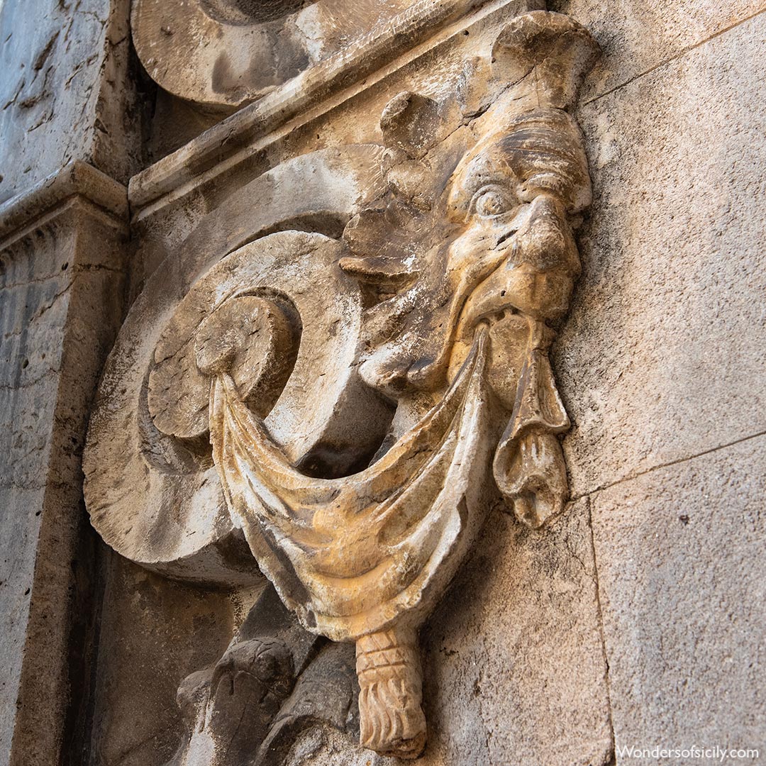 Relief by the main entrance of Chiesa di Santo Stefano