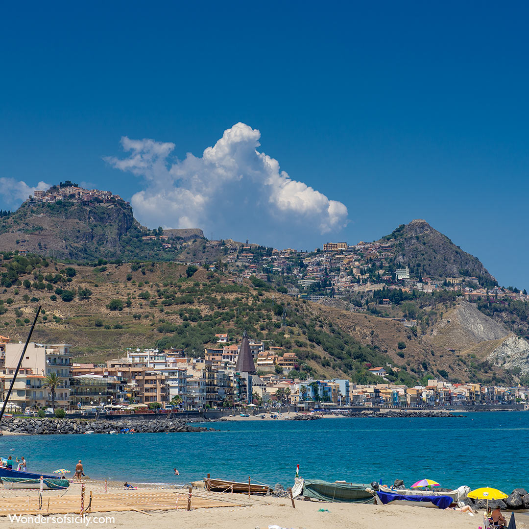 Castelmola (left) and Taormina, seen from Naxos