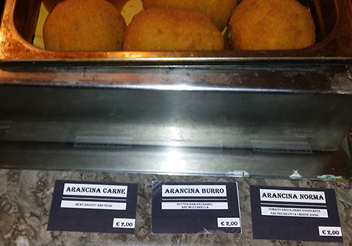 Arancini: arancina carne, arancina burro, arancina norma