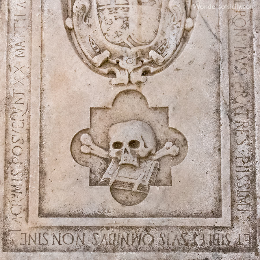 Skull and crossbones on a grave in San Giorgio dei Genovesi, Palermo